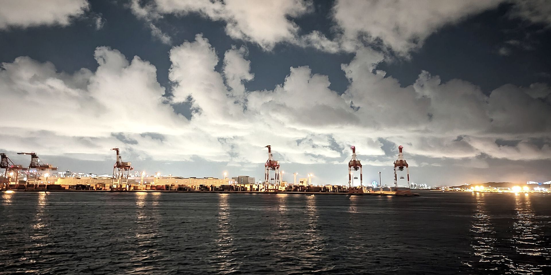 Container terminal cranes at dusk